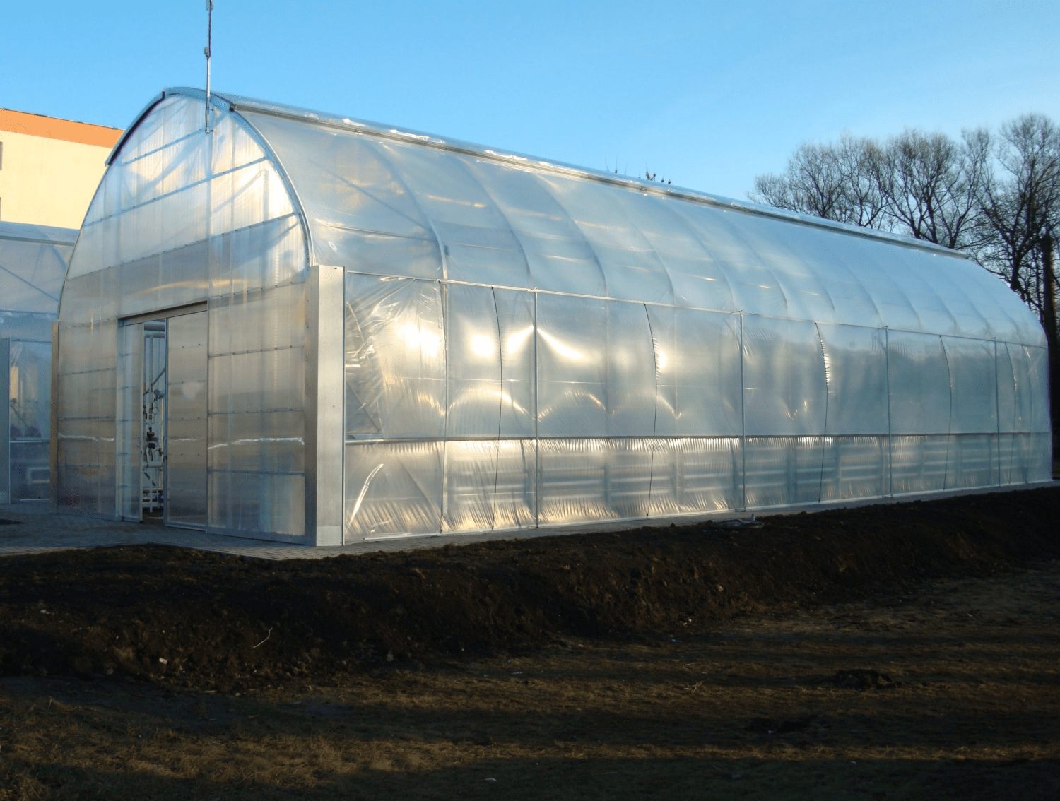 Exterior view of the completed Greenhouse Agro Tunnel